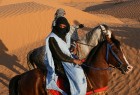 Saulriets Sahāras tuksnesī apbur un vilina 15