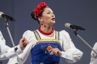 XXV Vispārējo latviešu dziesmu un XV deju svētku ietvaros pirmdien, 1. jūlijā, Lielajā Ģildē notika mazākumtautību kolektīvu koncertuzvedums Zem viena 12