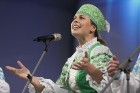 XXV Vispārējo latviešu dziesmu un XV deju svētku ietvaros pirmdien, 1. jūlijā, Lielajā Ģildē notika mazākumtautību kolektīvu koncertuzvedums Zem viena 24