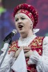 XXV Vispārējo latviešu dziesmu un XV deju svētku ietvaros pirmdien, 1. jūlijā, Lielajā Ģildē notika mazākumtautību kolektīvu koncertuzvedums Zem viena 31