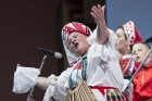 XXV Vispārējo latviešu dziesmu un XV deju svētku ietvaros pirmdien, 1. jūlijā, Lielajā Ģildē notika mazākumtautību kolektīvu koncertuzvedums Zem viena 33