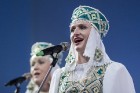 XXV Vispārējo latviešu dziesmu un XV deju svētku ietvaros pirmdien, 1. jūlijā, Lielajā Ģildē notika mazākumtautību kolektīvu koncertuzvedums Zem viena 53