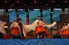 Latviju starp trīspadsmit dažādu tautu un valstu kolektīviem festivālā pārstāvēja tautas deju ansamblis Rucavietis, amatnieki no mākslas studijas Kurs 6