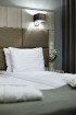 Visi 120 viesnīcas Wellton Centrum Hotel & Spa numuri ir iekārtoti klasiski, mūsdienīgā stilā un aprīkoti atbilstoši visiem starptautiskajiem 4 zvaigž 11