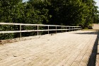 Rīvas upes koka tilts ir Latvijā vienīgais koka atgāžņu sistēmas konstrukcijas tilts 6
