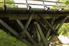 Rīvas upes koka tilts ir Latvijā vienīgais koka atgāžņu sistēmas konstrukcijas tilts 9