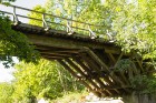 Rīvas upes koka tilts ir Latvijā vienīgais koka atgāžņu sistēmas konstrukcijas tilts 10