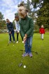 Golfa kluba «Golf Club Viesturi» atvērto durvju dienas dalībnieki ar entuziasmu apgūst golfu 3