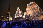 Ar Ginesa pasaules rekordu Rīgā krāšņi iededz Ziemassvētku egli 7