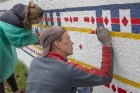 Vecmīlgrāvieši Latvijai simtgadē dāvina latviski apgleznotu sienu 6